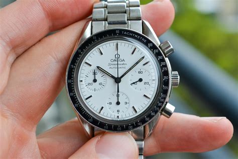 omega speedmaster white face.